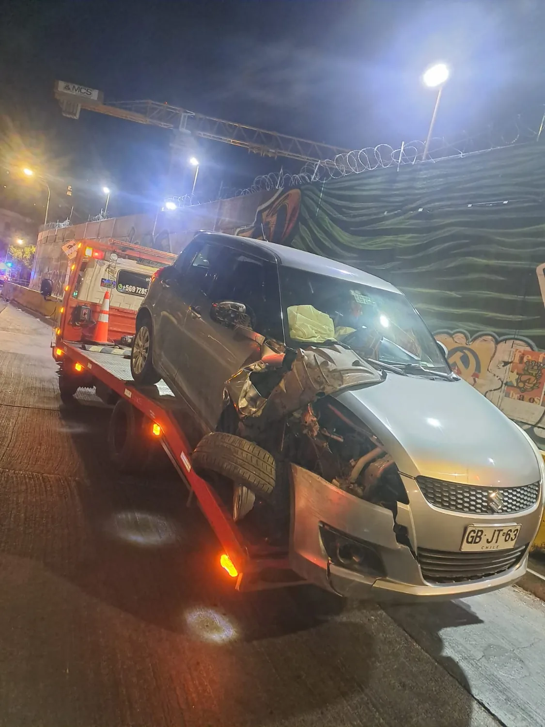 rescate vehicular nocturno con grúa cama en Santiago